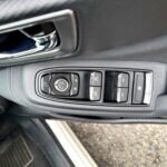 2020 subaru forester sk9 driver door with mirror and window controls visible.