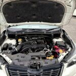 2020 subaru forester sk9 engine bay with the bonnet raised for inspection.