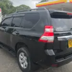 2015 Toyota Prado TX black rear side view at Carmart Mombasa